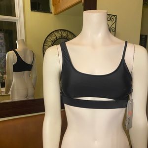 Ira 🖤 NWT Black sports bra. Unique straps. Medium. Brand new